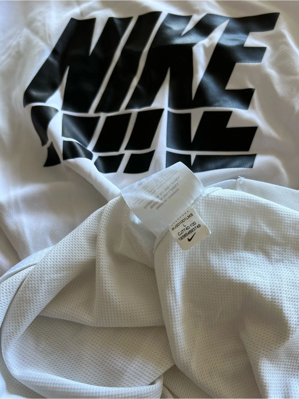 Nike White Short-Sleeve Tee with Black NIKE Graphic